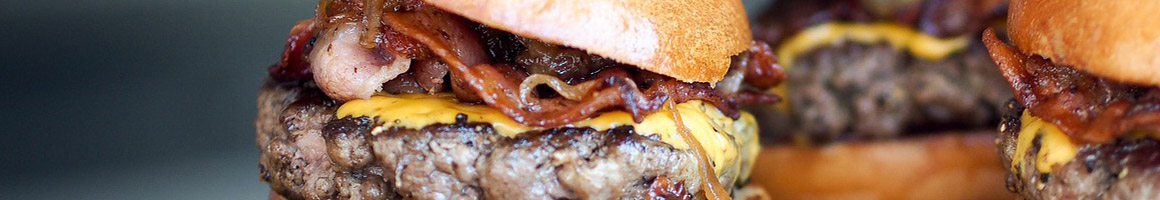 Eating Burger at Charlie's King Falafel restaurant in Orcutt, CA.